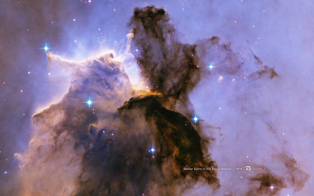 HubbleSite - Wallpaper: Stellar Spire in the Eagle Nebula