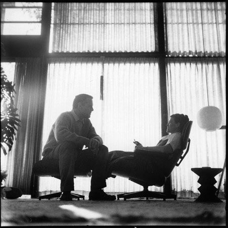 B , Charles, right, and Ray Eames sitting on their...