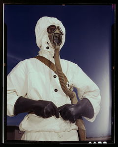 Flickr Photo Download: Sailor at the Naval Air Base wears the new type protective clothing and gas mask designed for use in chemical warfare, Corpus Christi, Texas. These uniforms are lighter than the old type (LOC)