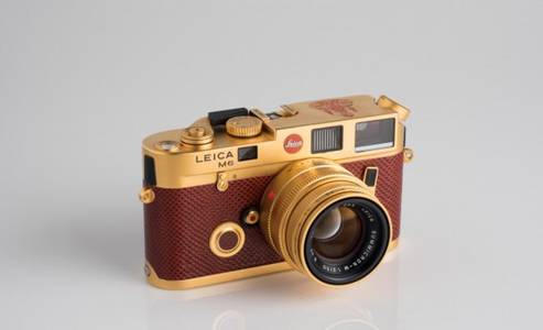 Leica's limited-edition golden cameras honoring HM the King go on display next week, and you can actually buy one